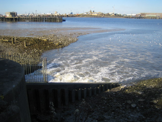 Treated effluent outfall from Crossness Sewage Treatment Works into the River Thames.